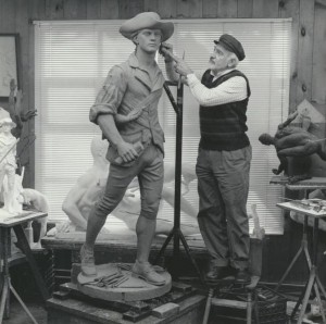 sculptor with statue